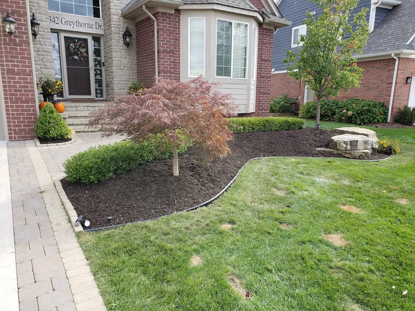 Landscape planting and mulch installation in Oakland County Michigan