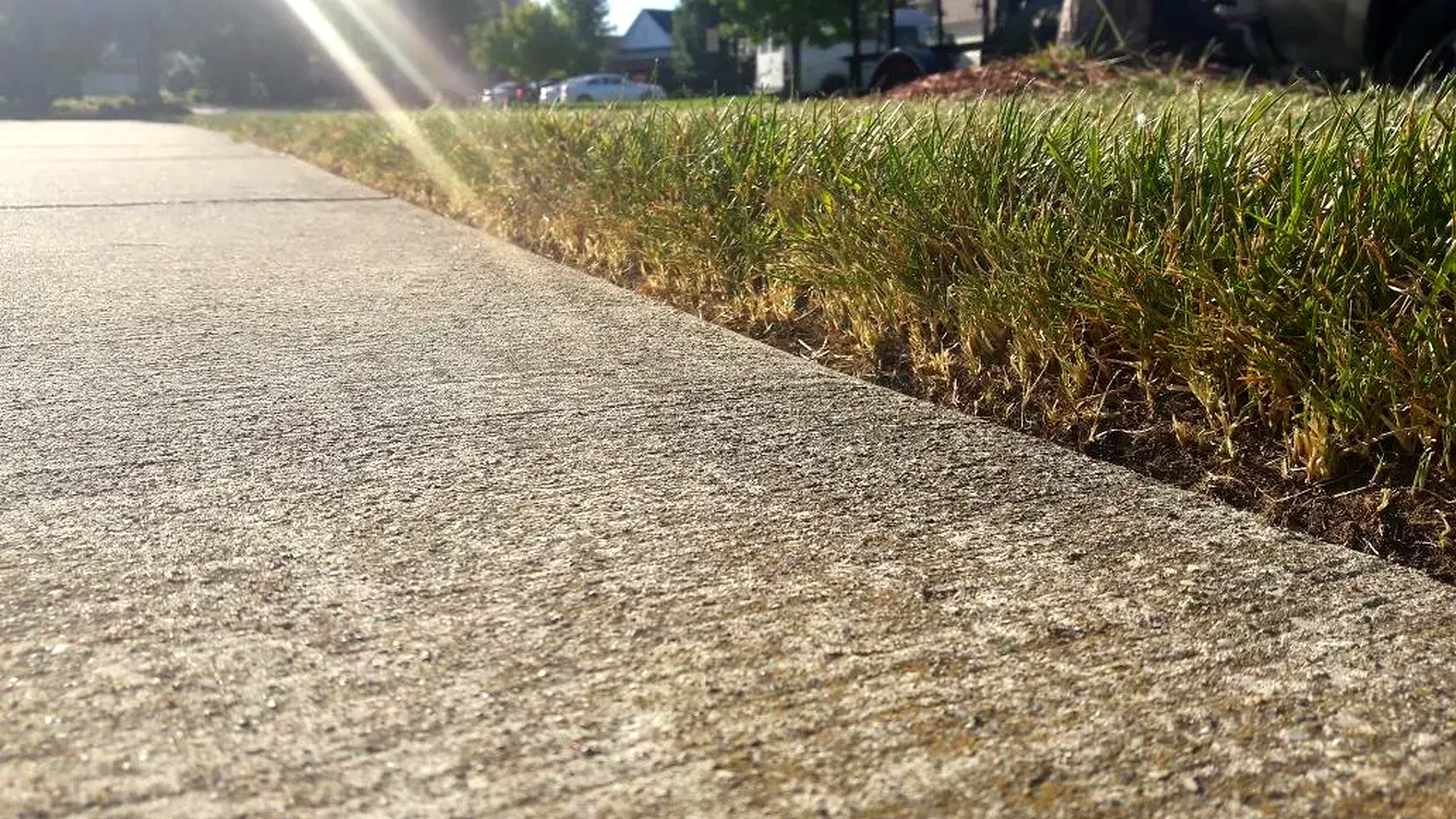 Lawn mowing and crisp sidewalk edging service in Rochester Hills Michigan