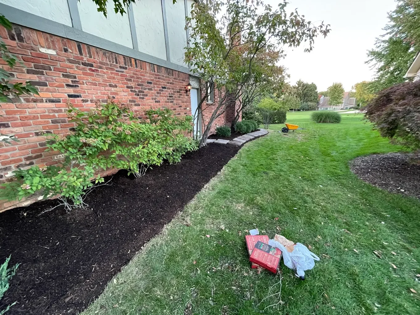 Professional mulch installation landscape bed Rochester Hills MI